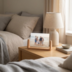 Beech and acrylic photo frame on a bedside table