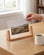 Sliding a photo into the wood and acrylic frame
