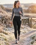 Woman in black Thornby fleece-lined leggings on a frosty winter walk in the British countryside