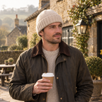 Man in the sand ribbed beanie outside a Cotswolds pub on a crisp morning