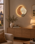 Halloway LED wall clock in terracotta glowing above a sideboard in a British living room