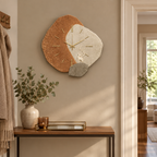 Terracotta wall clock in a hallway with the light off