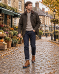 Man wearing the Thornbury lace-up boots in Brown on a cobbled street