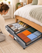 Harrington wheeled underbed storage box in Black being pulled from under a bed