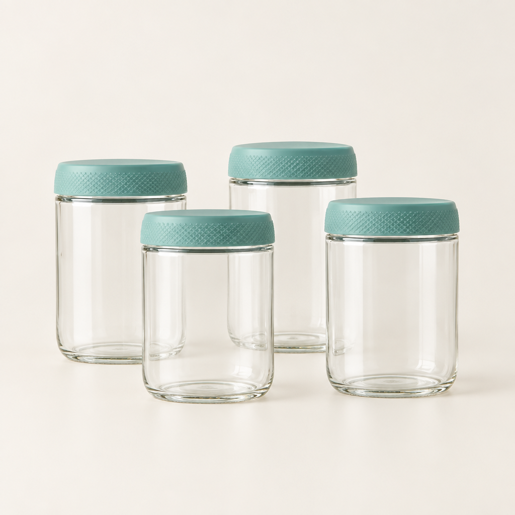 Evesham glass storage jars with Green lids