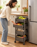 Stamford rolling kitchen trolley in Grey beside a fridge
