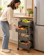 Stamford rolling kitchen trolley in Grey beside a fridge